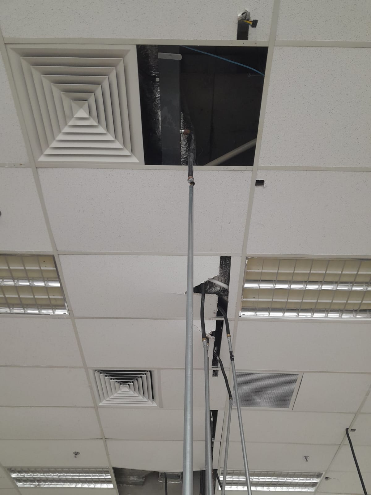 AR Engineering Ceiling Partition Singapore — T-bar grid suspended ceiling installation